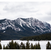 A snow covered mountain to show the best best snowshoe trails near Belgrade, Montana