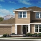 Artist rendering of a tan exterior of an Appaloosa Plan 4 home at Prescott Ranch in a traditional style.